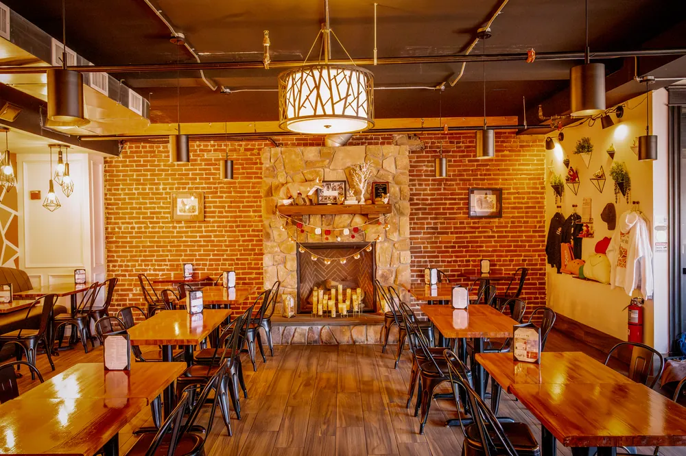 The stone fireplace in the dining room